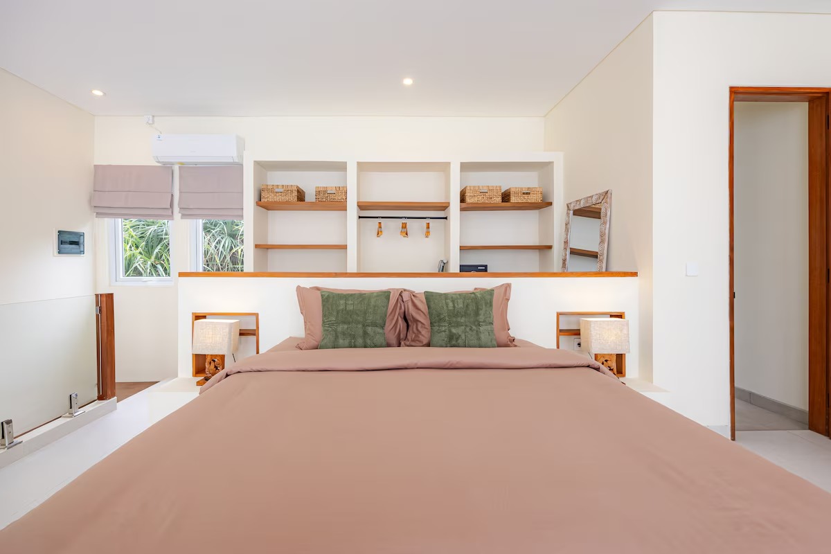Mezzanine bedroom, view toward the glass railing